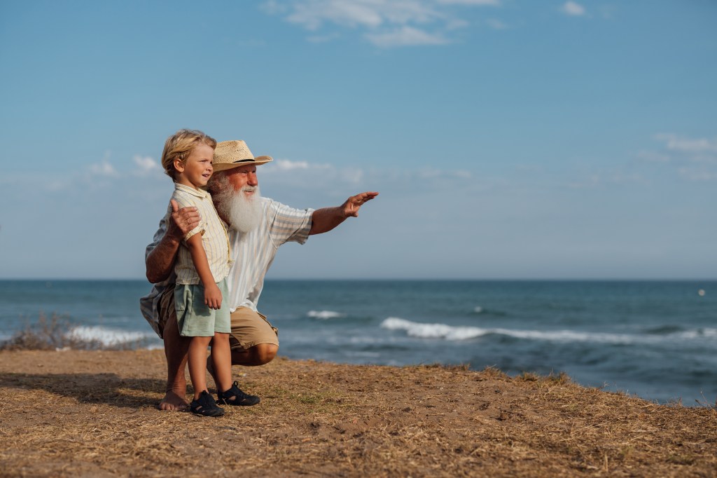 Grandparent with Grandchild symbolizing life insurance for kids